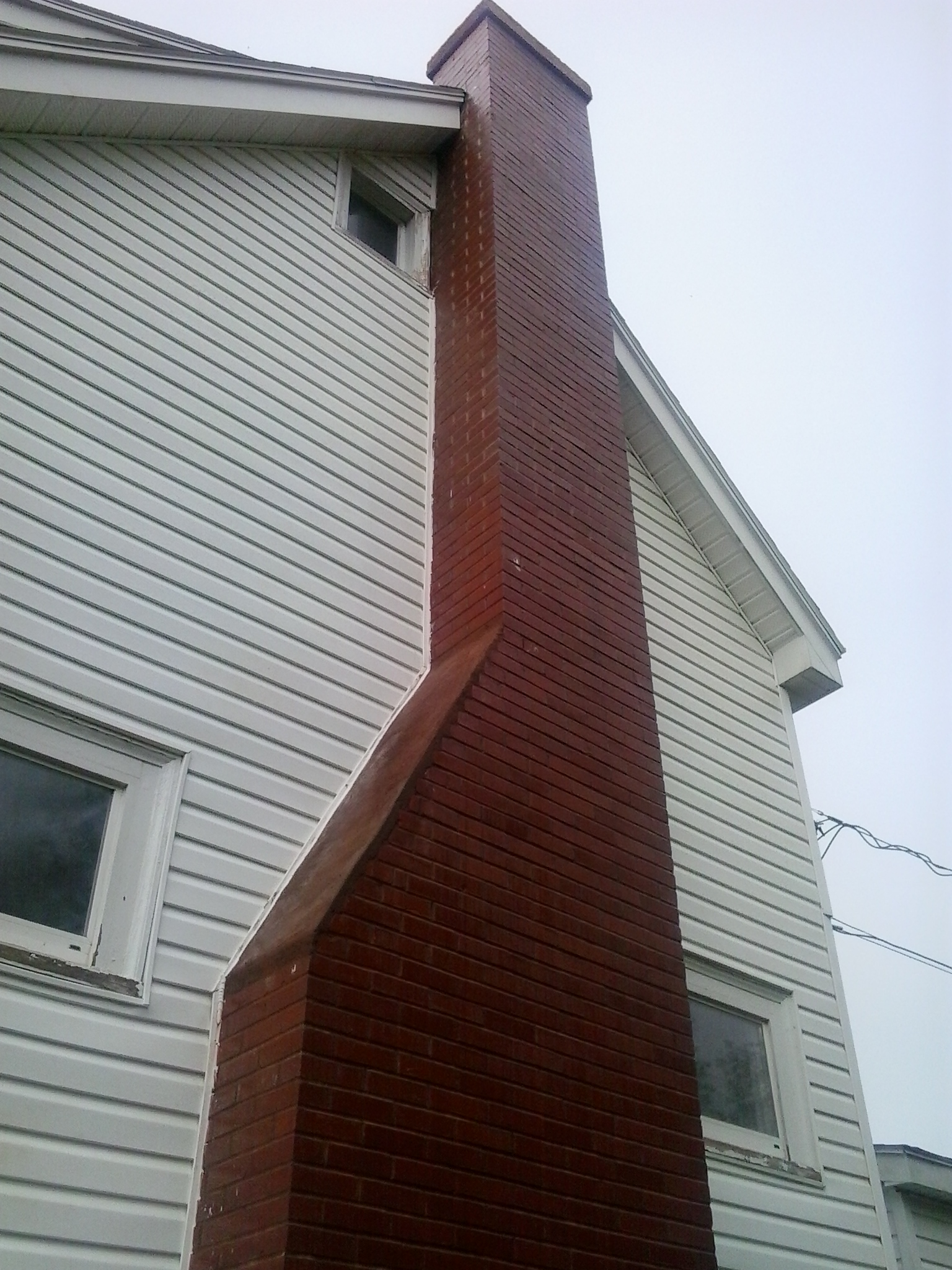 image of chimney-chimney repair services completed in Halifax-Dartmouth Regional Municipality, NS by Pro Chimney Services based in Halifax, NS servicing all of the Halifax-Dartmouth Regional Municipality, Bedford, Sackville, Mount Uniacke, Windsor, Hantsport, Wolfville, Kentville, Chester, Mahone Bay, Lunenburg, Bridgewater, Liverpool, Fall River, Wellington, Enfield, Elmsdale, Brookfield, Truro, Musquodoboit Harbour & surrounding areas.