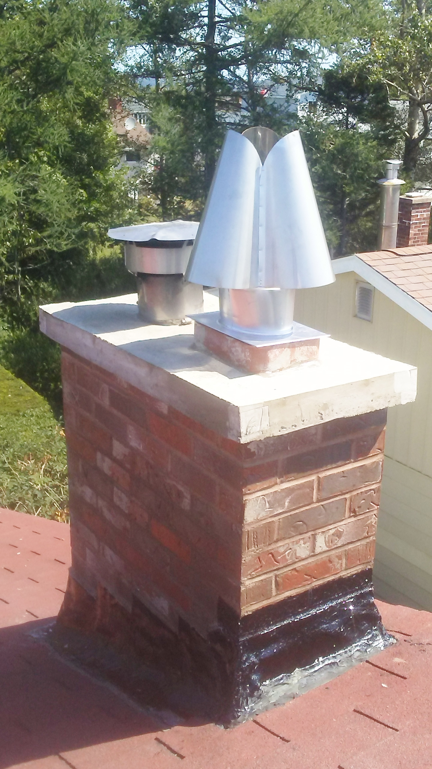 image of chimney cap or crown-chimney cap or crown services completed in the Halifax-Dartmouth Regional Municipality by Pro Chimney Services based in Halifax, NS servicing all of the Halifax-Dartmouth Regional Municipality, Bedford, Sackville, Mount Uniacke, Hantsport, Windsor, Wolfville, Kentville, Chester Basin, Mahone Bay, Lunenburg, Bridgewater, Liverpool, Fall River, Wellington, Enfield, Elmsdale, Brookfield, Truro, Musquodoboit Harbour & surrounding areas.